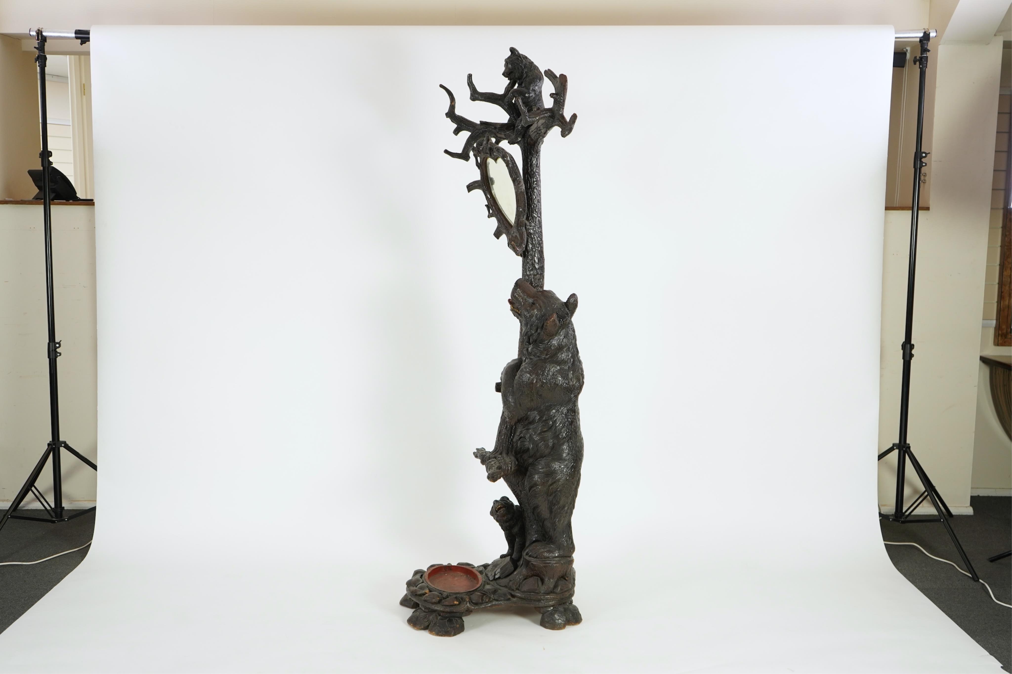 A late 19th century Black forest carved bear hallstand
